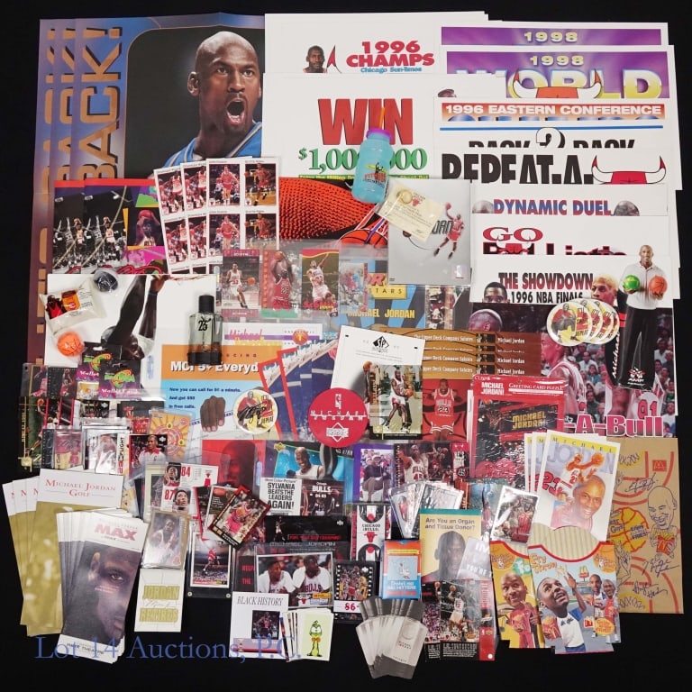 Box Of All Things Michael Jordan: This is a box loaded with all sorts or Michael Jordan memorabilia. There is an unboxed bottle of Michael Jordan Cologne, various printed advertisements featuring Michael Jordan, various pieces of McDo