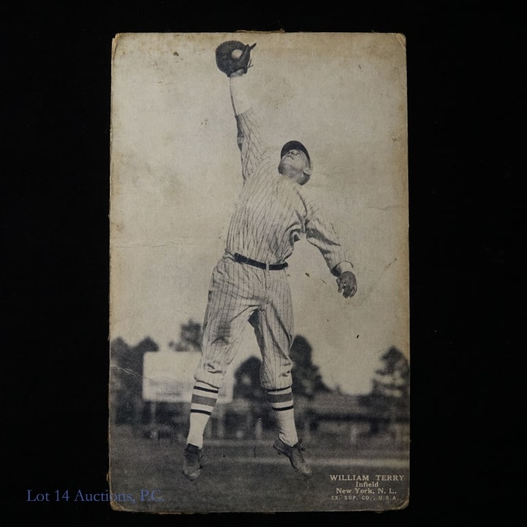 1927 Exhibits William Bill Terry Baseball Card: 1927 Exhibits card featuring William Terry (Bill Terry) - infielder, New York Giants 3-5/16" x 5-3/8". Corners are rounded with wear. Dirt / staining along edges on front. Tape residue on back.