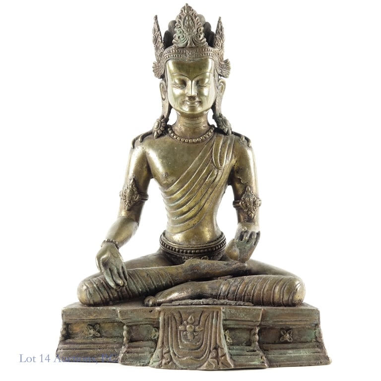Bronze Bodhisattva Avalokiteshvara Statue, 14": Bronze Bodhisattva Avalokiteshvara statue. Several holes in the base and legs. See photos for details. Measures approximately 10" X 5.5" X 14". Weighs approximately 7lbs.