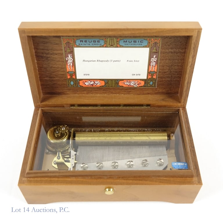 Vintage Swiss Reuge 72 Note Music Box: Original Reuge Swiss 72 note music box, plays Hungarian Rhapsody (3 Parts) by Franz Liszt. Seems to be in excellent working condition, very few scratches on the mahogany case. Beautiful piece.