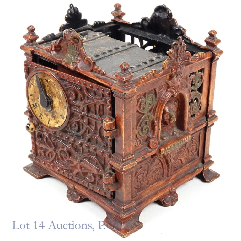 Fidelity Trust Cast Iron Mechanical Vault C.1890: Fidelity Trust mechanical bank vault made by J. Barton Smith Co. Philadelphia, PA circa 1890. Paper clock face shows some print loss but is fully intact. Card board box with a metal pull is included a