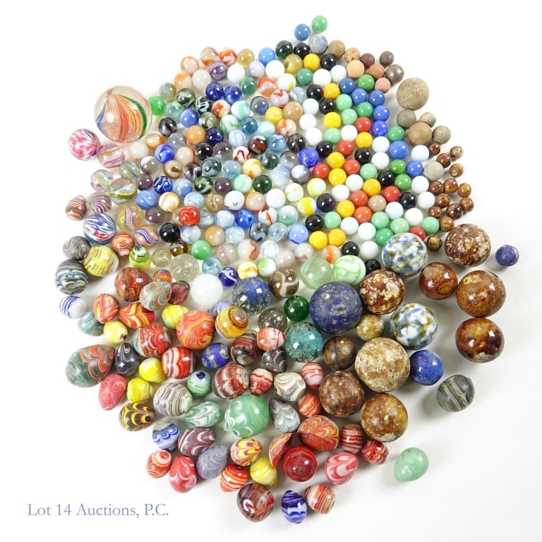 Marbles Glass, Stone, Ceramic, Glass Eggs (7lbs+): More than 7lbs of glass, stone, clay and glazed ceramic marbles. Various sizes up to 2" in diameter. This includes more than 1.75lbs of miniature glass eggs between 0.7" and 1.5" in height. See photos