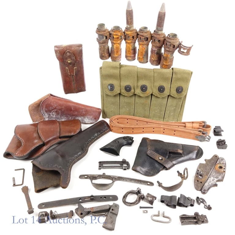 Magazine Pouches, Gun Holsters, Colt Grips, More: Four (4) various gun holsters, WWII olive 5 pocket Thompson magazine pouch, leather Luger magazine pouch, Colt eagle pattern grips, six (6) rounds of 20mm WWII ammunition mounted on a feeding metal be