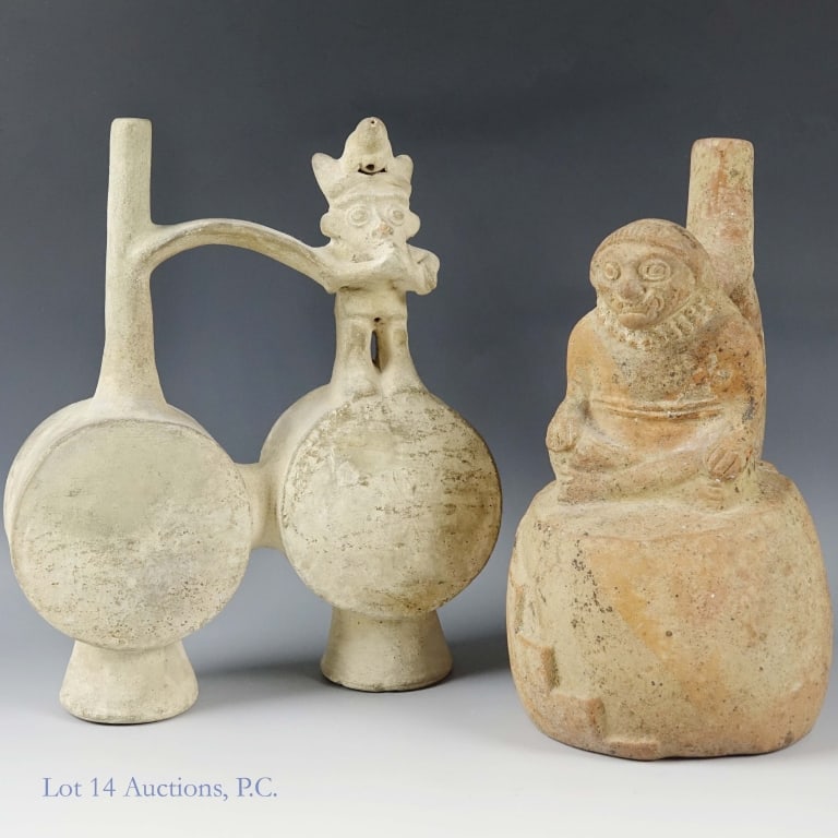 Pre Columbian Peruvian Pottery: Two vessels made in Pre Columbian Peru. The first is a Moche stirrup-spout vessel, approximately 8" tall at the highest point. It has a couple of stable cracks that appear to have been repaired at som