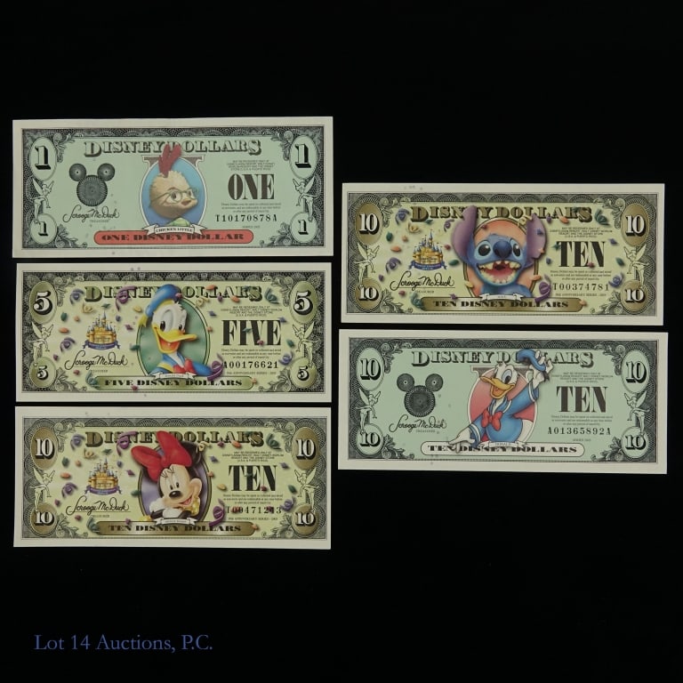 2003 & 2005 $5 & $10 Disney Dollars in CU (5): Five (5) United States ungraded Disney Dollar notes as follows: ---2003 $10 Donald Duck (s/n A01365892A), ---2005 $1 Chicken Little (s/n T10170878A), ---2005 $5 Daffy Duck (s/n A00176621), ---2005 $10