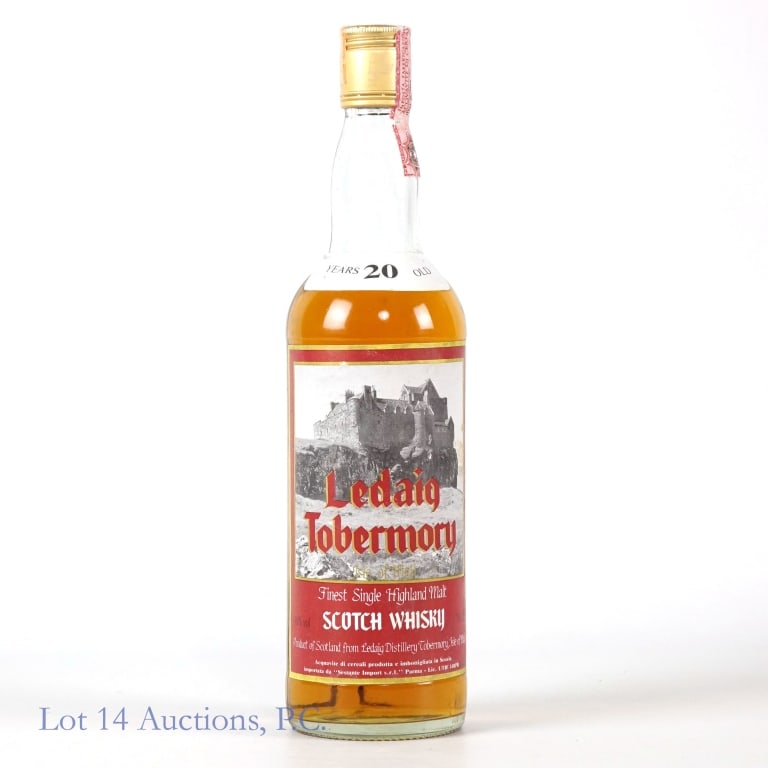 Ledaig Tobermory Scotch Whisky - 20 Years (via It): Ledaig Tobermory finest single Highland malt Scotch whisky. 40% ABV (80 proof). 70 cl (700 ml). Tax strip appears to be Italian (label notes Sestante Import, Parma).
