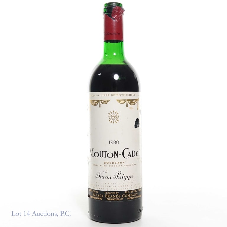 1988 Mouton Cadet Bordeaux: 1988 Baron Philippe de Rothschild Mouton Cadet, 11.5% ABV, 750ml, Vintage: 1988, Region: Bordeaux, France, Appellation: Bordeaux. Damage to front and back labels. Top of the foil is missing. See photo