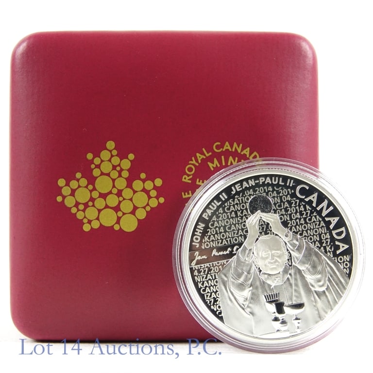 2014 RCM Silver $10 Pope John Paul II in OGP: 2014 Canada silver proof $10 Pope John Paul II canonization commemorative coin (Royal Canadian Mint) in OGP with COA. Metal is 99.99% silver and weighs 23.17 grams. Reverse image from phot of Pope Joh