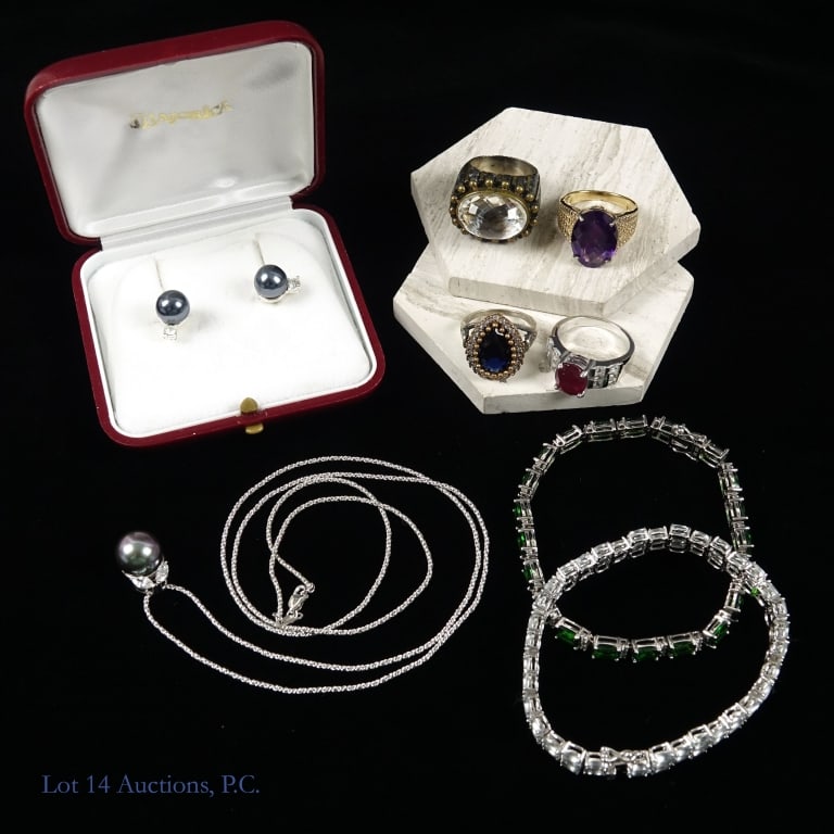 Sterling Silver Jewelry With Stones, Pearls: Sterling silver jewelry - Two (2) bracelets ****** Four (4) rings ****** Majolica pearl pendant necklace and earrings in original box. Total weight approximately 3.17ozt.