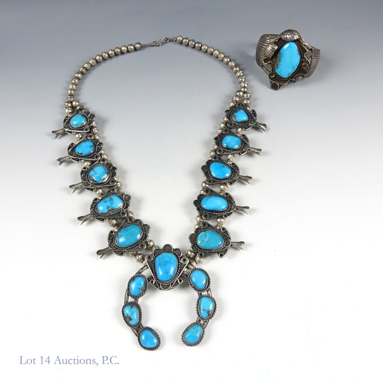 Sterling Silver Turquoise Squash Blossom Jewelry 2: 8.5ozt Sterling silver and turquoise squash blossom necklace and cuff. Native American Squash Blossom necklace lined with metal beads and turquoise pendants, alongside a matching metal cuff. Not marke