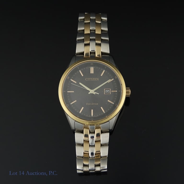 Citizen Eco-Drive E111 Watch: Very lightly used Citizen Eco-Drive watch, model E111-S083320, sapphire Japan movement. Good condition apart from some scratches on the band, see photos for details.