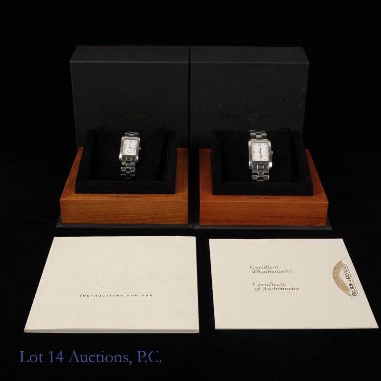 Baume & Mercier Hampton His & Hers Watches (2): Early 2000s Baume & Mercier Hampton matching his and hers watches. Stainless steel cases and bracelets. Quartz movements with seconds sub dial at 6 o'clock . Watch cases measure approximately 24.5" x