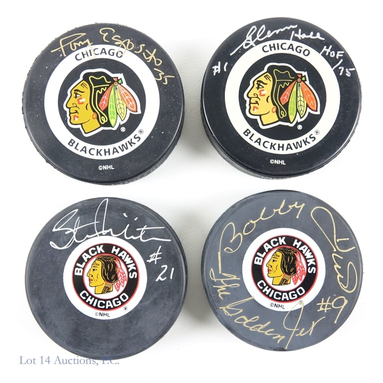 4 Signed Pucks B. Hull, Mikita, Hall, Esposito: Four signed Pucks from former Blackhawks players that have been inducted into the NHL HOF. You will find signed pucks from Glenn Hall, Tony Esposito, Bobby Hull, and Stan Mikita. None of the signature