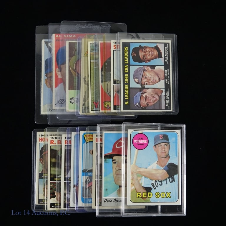 16 Baseball Cards From 1950'a & 1960's: Sixteen different Topps baseball cards from the early 1960's up to 1970. There are 7 cards featuring League leaders Along with individual player cards of Carl Yastrzemski, Pete Rose, Brooks Robinson,