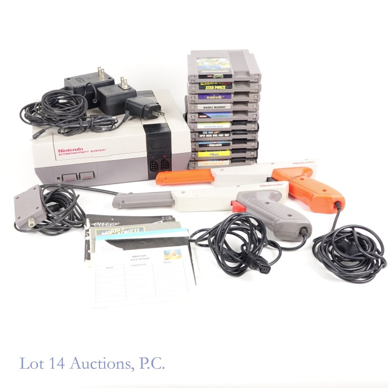Nintendo Entertainment System Console & Games (10): Nintendo Entertainment System Console & 10 Games. Model No. NES-001. SN: N25997033. Includes: AC adapter, RF switch, 2 Nintendo Zapper controllers, and manuals. Games include: Operation Wolf, Super Ma