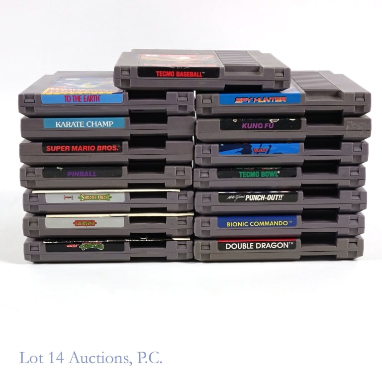 Nintendo NES Video Game Cartridges (15): 15 Nintendo Entertainment System NES game cartridges: Double Dragon, Bionic Commando, Mike Tyson's Punch Out, Tecmo Bowl, Spy Vs. Spy, Kung Fu, Spy Hunter, Super Mario Bros., Karate Champ, To The Eart