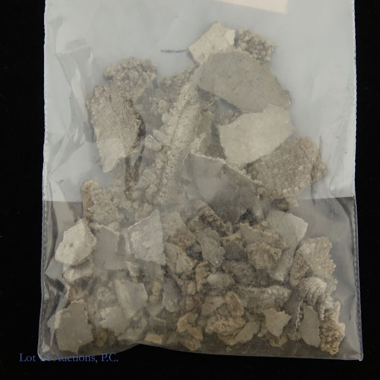 85 Grams Scrap 95+% Silver (2.6+ozt ASW): 85 grams (2.7ozt.) of 95+% Fine Silver (2.6+ozt ASW), in Scrap Form. Lot 14 Guarantees that the stated weight of the silver is accurate or below the actual mass. Lot 14 also guarantees that the purity