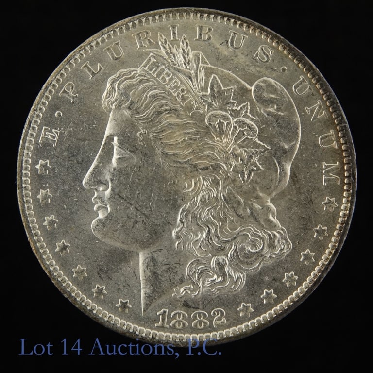 1882-O USA Silver Morgan Dollar (CH BU): 1882-O United States silver Morgan dollar (New Orleans Mint). Designer is George T. Morgan. Per consigner, in CH BU condition with slight edge toning. Mintage 6,090,000. Silver content confirmed on Lo