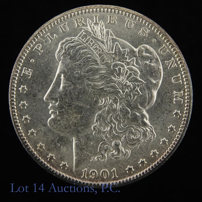 1901-O USA Silver Morgan Dollar (BU): 1901-O United States silver Morgan dollar (New Orleans Mint). Designer is George T. Morgan. Per consigner, in BU condition with slight toning around edge. Mintage 13,320,000. Silver content confirmed