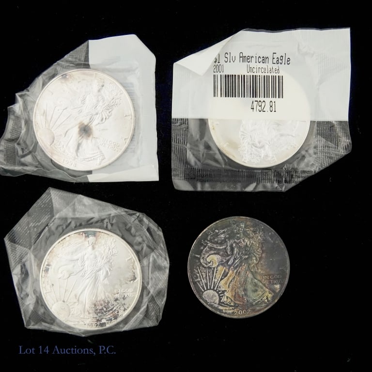 American 99.9% Silver Eagle $1 Bullion Coins, 4: Four (4) American silver eagle uncirculated dollar bullion coins. Dates as follows: ---1997, ---1998, ---2001 and ---2002. Metal 99.9% silver, weighs 31.103 grams (1 troy ounce), and diameter 40.60 mm