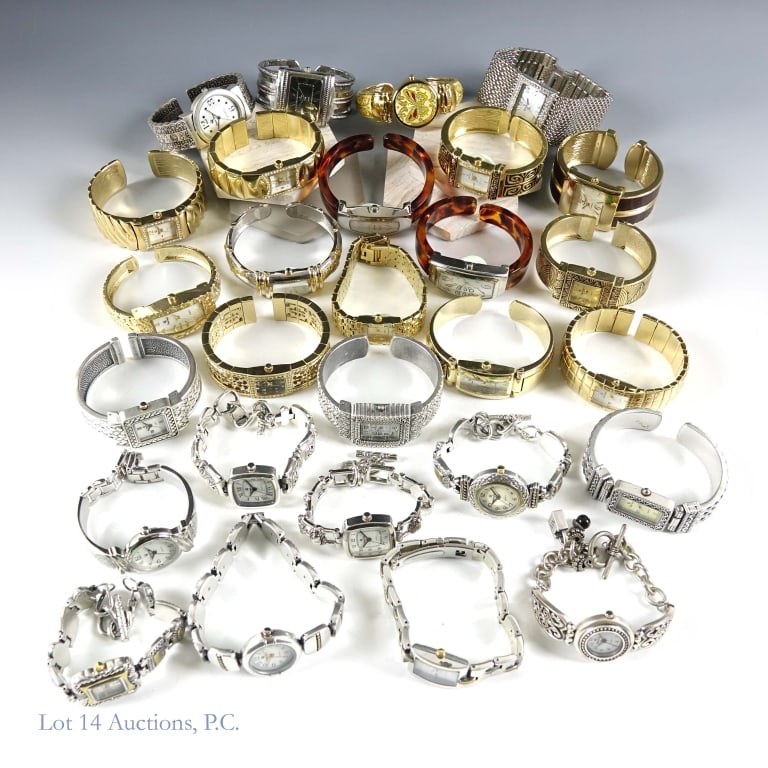 Premier Designs Ladies' Watches NOS (28): Twenty eight (28) various Premier Designs ladies' watches. Most have cuff style bracelets. Watches were sales representative samples and have never been worn, but do not include boxes or paperwork. Se