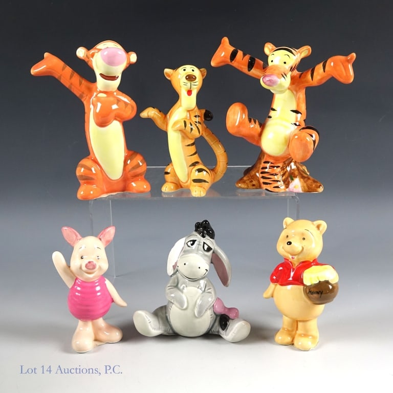 Vintage Winnie The Pooh Porcelain Figures: 6 Vintage porcelain figures from the Disney Store in the 1990s, all depicting characters from the Winnie the Pooh franchise. They range in size from 3.25" tall to 4.25" tall. Most are in good conditio