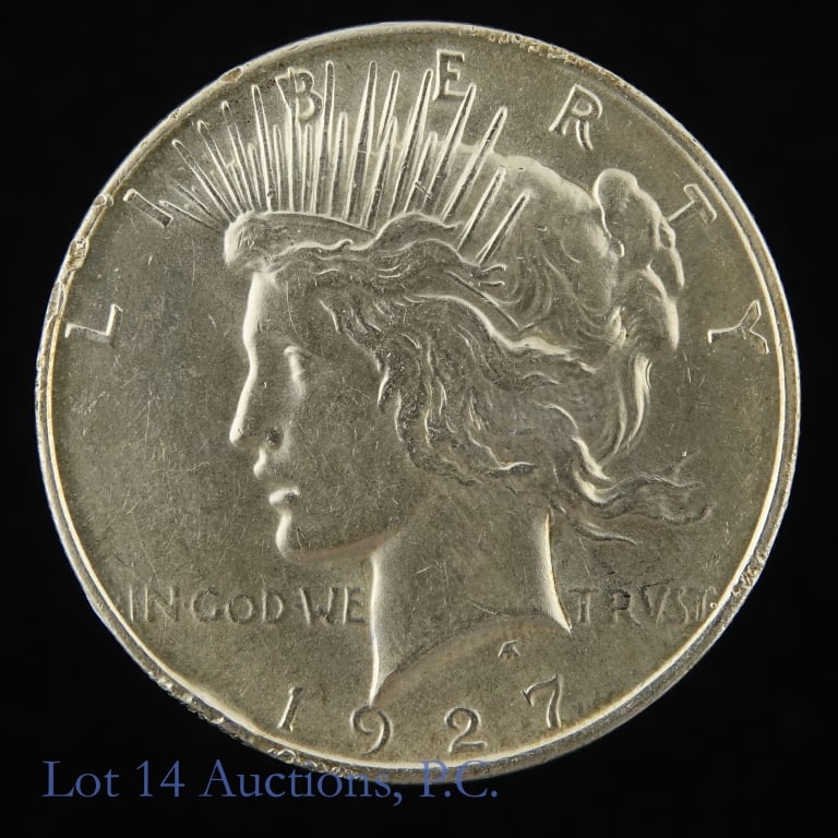 1927 (P) USA Silver Peace Dollar: 1927 (P) United States silver peace dollar (Philadelphia Mint) a key date. Designer is Anthony de Francisci. Per consigner, grades CH BU. Metal is 90% silver and weighs 26.73 grams. Mintage is 848,000