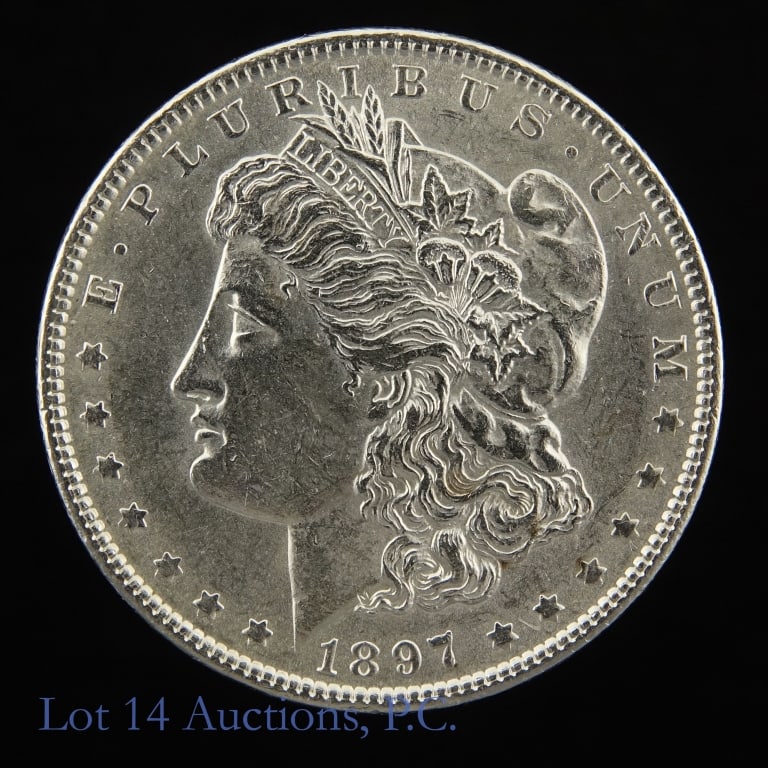 1897 (P) USA Silver Morgan Dollar: 1897 (P) United States silver Morgan dollar (Philadelphia Mint). Per consigner in BU condition with full mint luster. Metal is 90% silver and weighs 26.73 grams. Mintage 2,822,000. Silver content conf