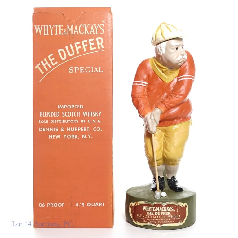 1970 Whyte & Mackays The Duffer Scotch Decanter: 1970 Whyte & Mackays The Duffer Special Blended Scotch Whisky. Golf player porcelain decanter. Original box. Tax strip fully intact. 86 Proof, 4/5 Quart.