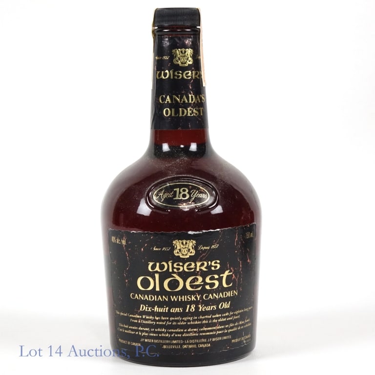 1970 Wiser's Oldest 18 Year Canadian Whisky: Wiser's Oldest 18 Year Canadian Whisky, 80 Proof, 750ml, Registered Bottle #C497864. 1970 Canada tax strip fully intact.