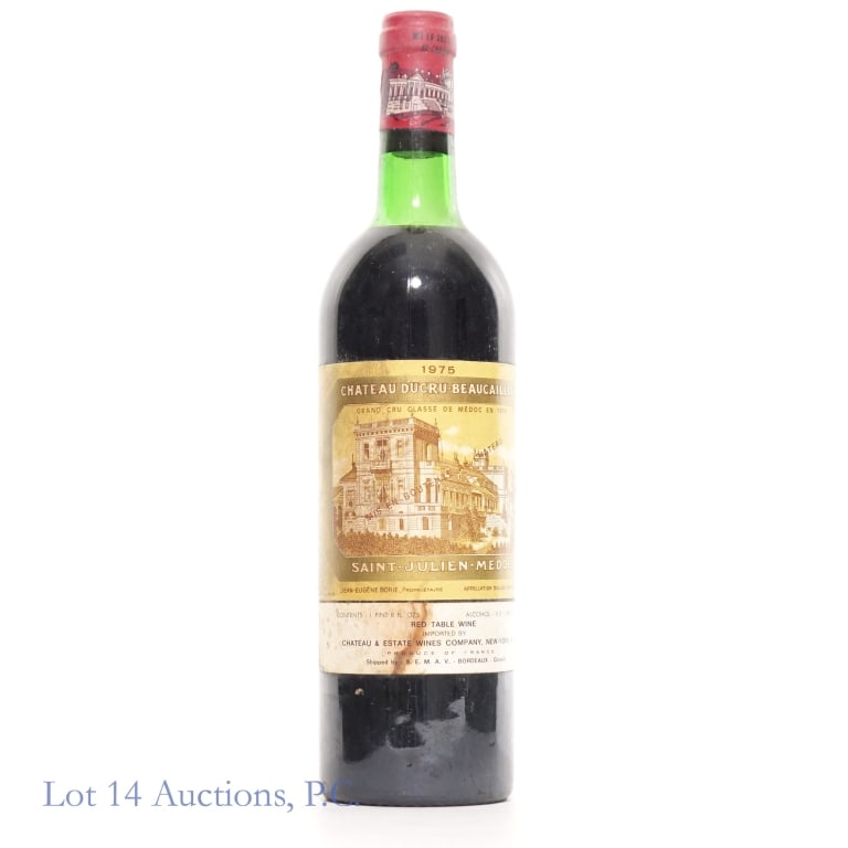 1975 Chateau Ducru Beaucaillou Bordeaux: 1975 Chateau Ducru Beaucaillou Bordeaux. Appellation Saint Julien. 11.5% ABV. 1 Pint 8 fl. oz. Staining and small nick on the lower label. Per consigner, all bottles were stored horizontally in a temp