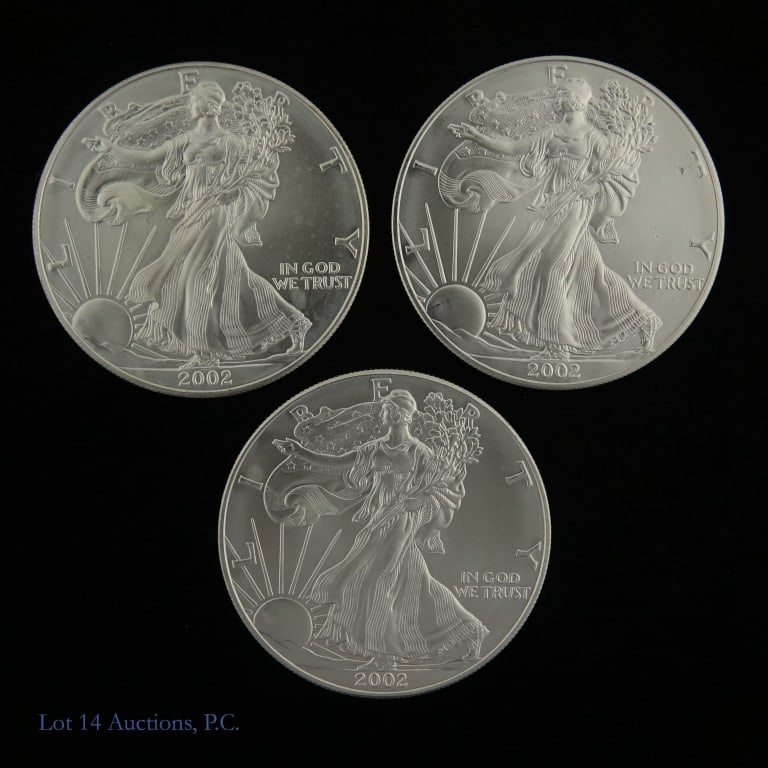 2002 (W) American Silver Eagle $1 Bullion (BU), 3: Three (3) 2002 (W) American silver eagle one dollar bullion coin (West Point Mint). Per consigner, in BU condition. Metal is 99.93% silver and weighs 31.103 grams (1 troy ounce) each coin. Mintage of