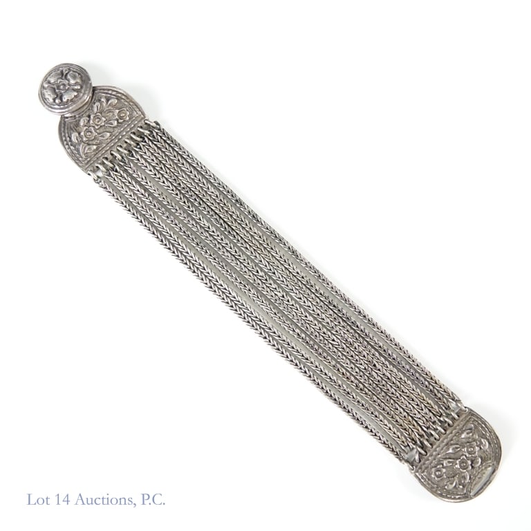 Sterling Silver Woven Bracelet, 2ozt.: Sterling silver bracelet made up of woven connectors and a floral centerpiece/connector. Total weight of piece is approximately 63.85g. One clasp damaged. Please see photos for details and condition.