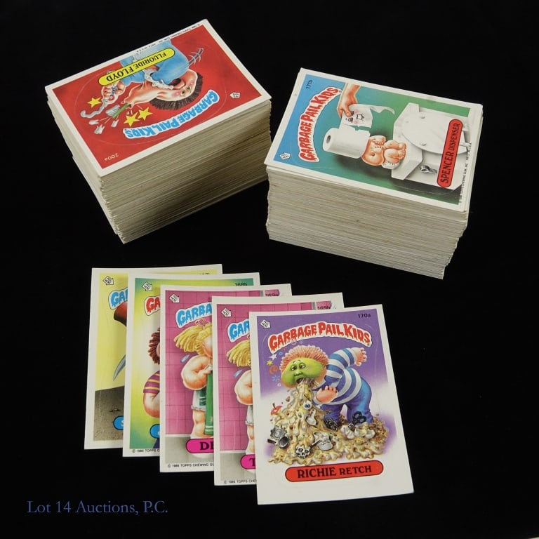 1986 Topps Garbage Pail Kids Cards (~275): Approximately 275 Topps Garbage Pail Kids card from 1986. There are a large number of duplicate cards in this assortment. The cards vary in condition with most having minor corner and edge wear.