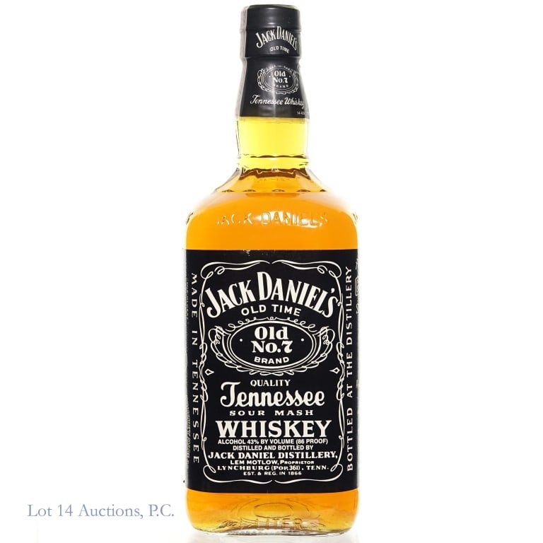 1995 Jack Daniel's TN Whiskey 1L: 1995 bottle of Jack Daniel's Tennessee Whiskey, 86 proof, 1L. Label peeling somewhat on left side.