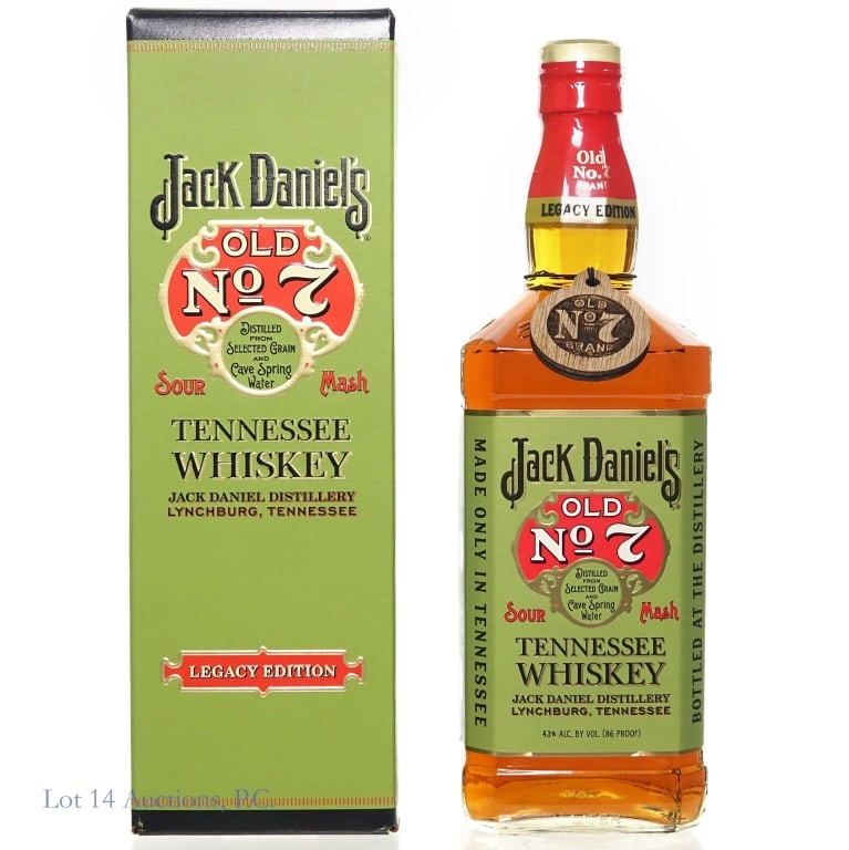 Jack Daniel's Legacy Edition 1 Tenn. Whiskey: Jack Daniel's Legacy Edition 1 Tennessee Whiskey, 86 Proof, 750 ml, Bottle #392947. Small nicks on edges of label. Wooden neck tag from White Rabbit Bottle Shop included. Box included.