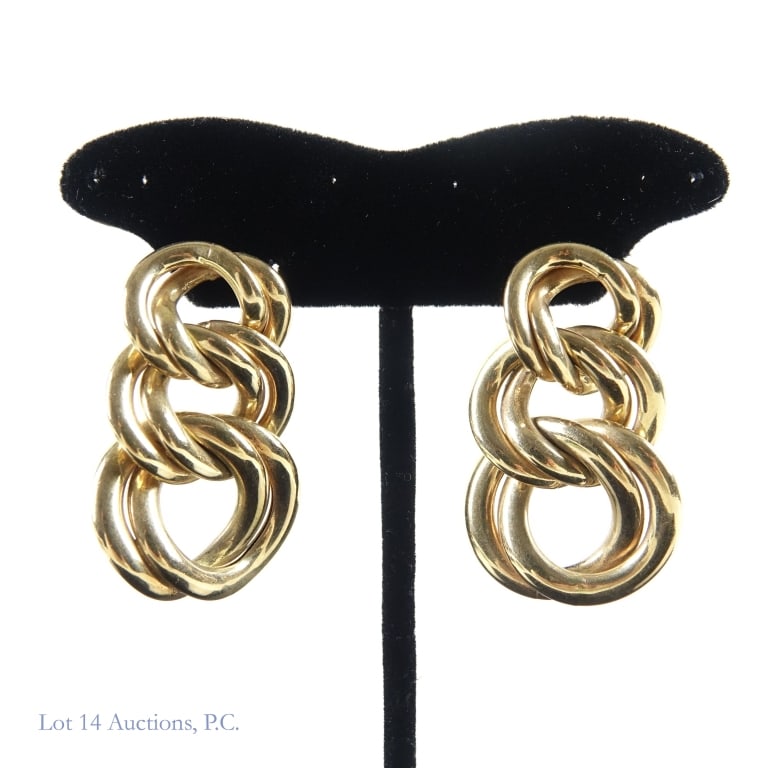 14k Y. Gold Dangle Earrings, Italy: 14k yellow gold dangle earrings. Marked 14k and Italy. 3 Pairs of connected rings. Approximately 1.75" long, 8.3dwt (12.95g) t.w.. With post and butterfly backing.