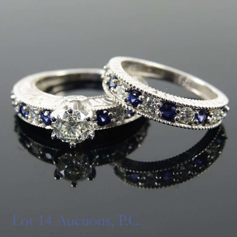 14k W Gold Diamond & Sapphire Ring Set w/ ID: Set of two size 6 bridal style rings made with 14k white gold, decorated with 12 diamonds and 12 sapphires (1.00 cttw center diamond, 0.90 cttw diamond sidestone, and 0.97 cttw blue sapphire).