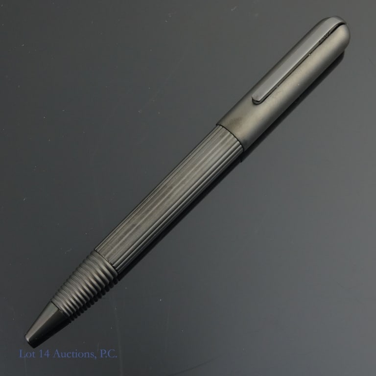 Lamy Imporium Black Titanium Ballpoint Pen CIB: Lamy Imporium black titanium twist ballpoint pen. Very small dent on the top next to the clip. Great condition otherwise. Original box and booklet included.