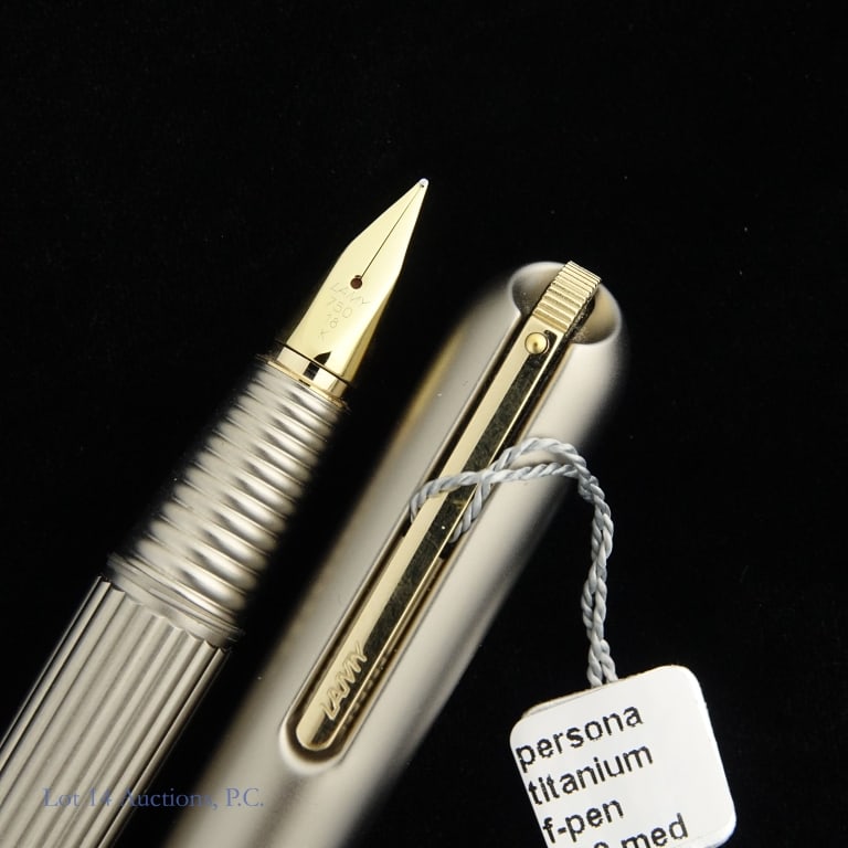 Lamy Persona Titanium Fountain Pen 18K Nib CIB: Lamy Persona Titanium fountain pen. 750 18K nib. Design by Mario Bellini. Original box, booklet, and polishing cloth included.