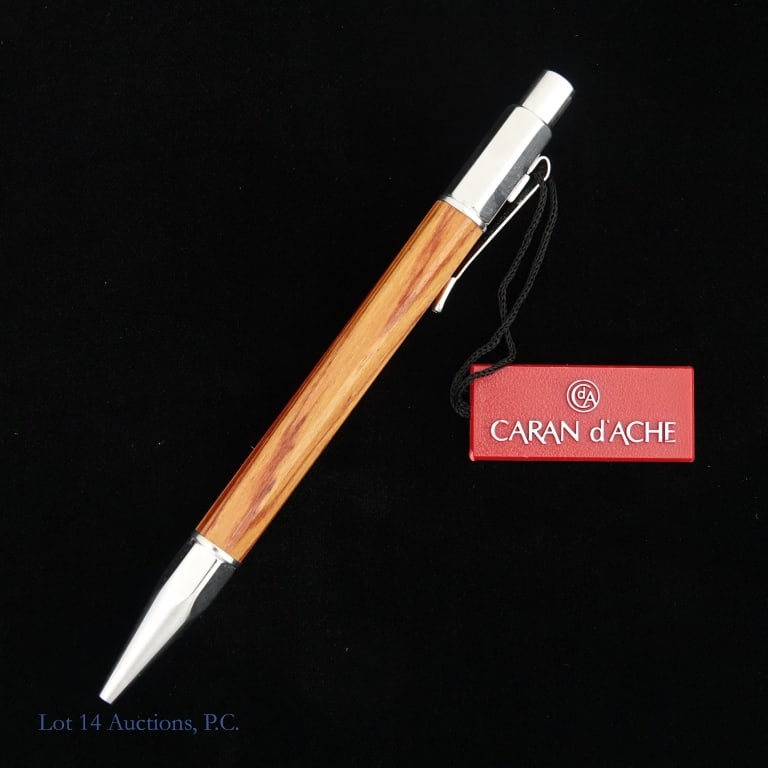 Caran d'Ache Metwood Ballpoint Pen CIB: Caran d'Ache Of Switzerland Metwood metal and wood ballpoint pen. Original wooden presentation box, outer cardboard box, plastic hang tag, and booklet included. See photos for details.