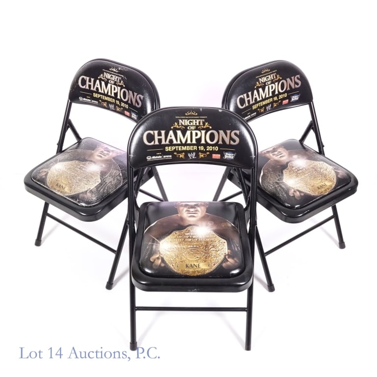 WWE 2010 Night of Champions Folding Chairs (3): *** LOCAL PICK UP or 3rd PARTY Shipping only. Lot 14 Auctions will not ship this lot in house. *** Three (3) metal folding chairs with vinyl covered cushions - back support cushion reads "World Wrestl