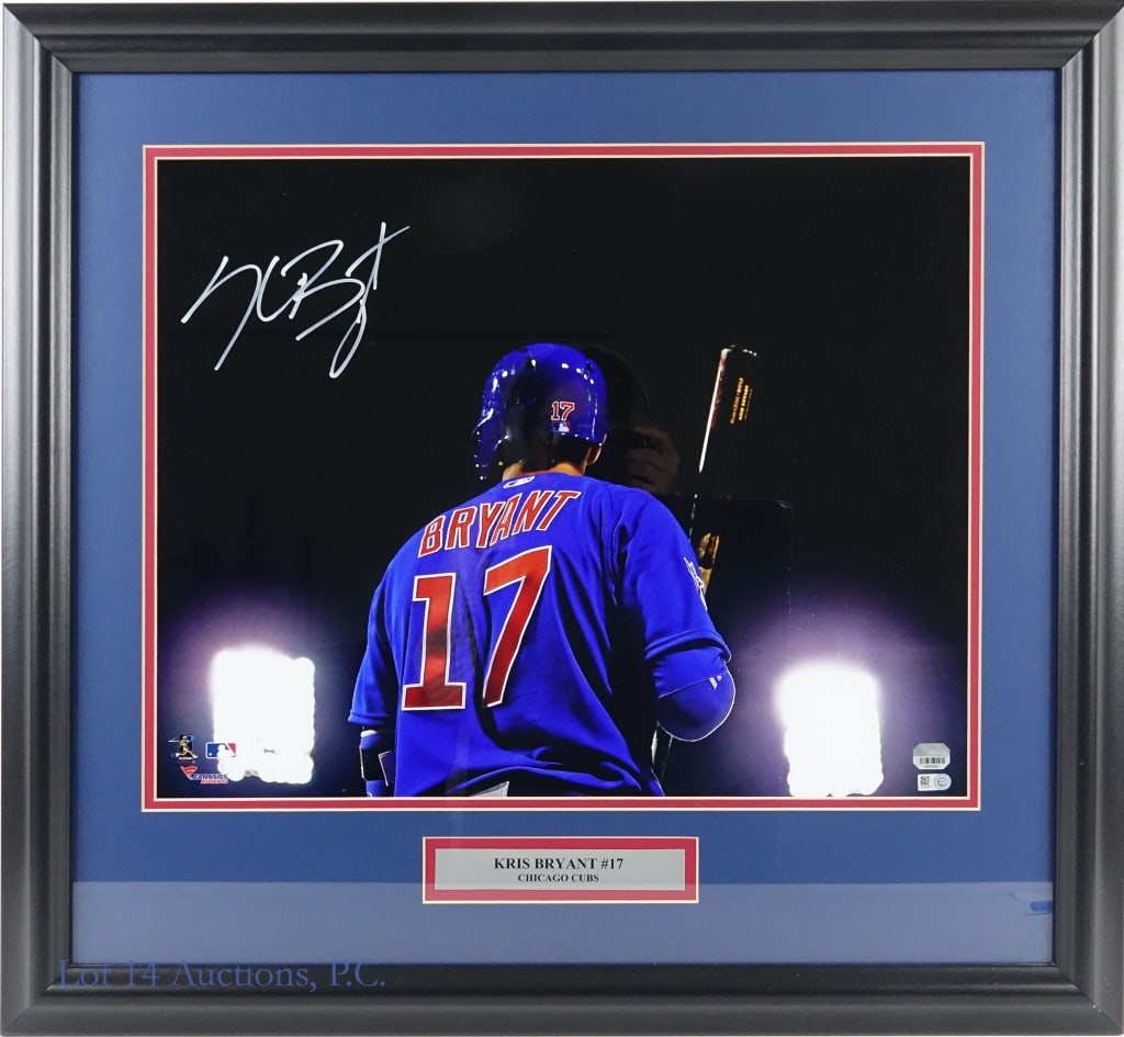 Kris Bryant Signed 16 x 20 Photo (MLB Beckett): LOCAL PICK UP OR THIRD PARTY SHIPPING ONLY. 16" x 20" framed and matted color photograph of Chicago Cubs 3B/OF Kris Bryant. Large Kris Bryant autograph in the upper left corner. Photo includes