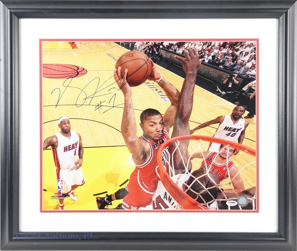 Derrick Rose Signed 16x20 Photo (PSA/DNA): LOCAL PICK UP OR THIRD PARTY SHIPPING ONLY. 16" x 20" framed and matted color photograph signed by NBA Chicago Bulls player Derrick Rose. PSA/DNA "In the Presence" certification (4A07351 - we have