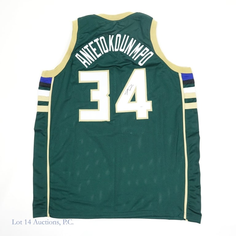 Giannis Antetokounmpo Signed Jersey (JSA): Milwaukee Bucks style reproduced #34 jersey (no manufacturer - size XL) signed by Giannis Antetokounmpo on the numeral "4" on back. JSA certified (RR98541) sticker on jersey and cert card with