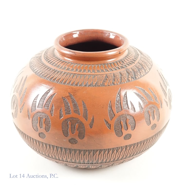 Large Navajo Pot Signed TC Dineh: Navajo red clay pot with bear claw designs, signed on the underside "TC Dineh". Dimensions are approximately 10 x 10 x 7.5". Good condition. See photos for details and condition.
