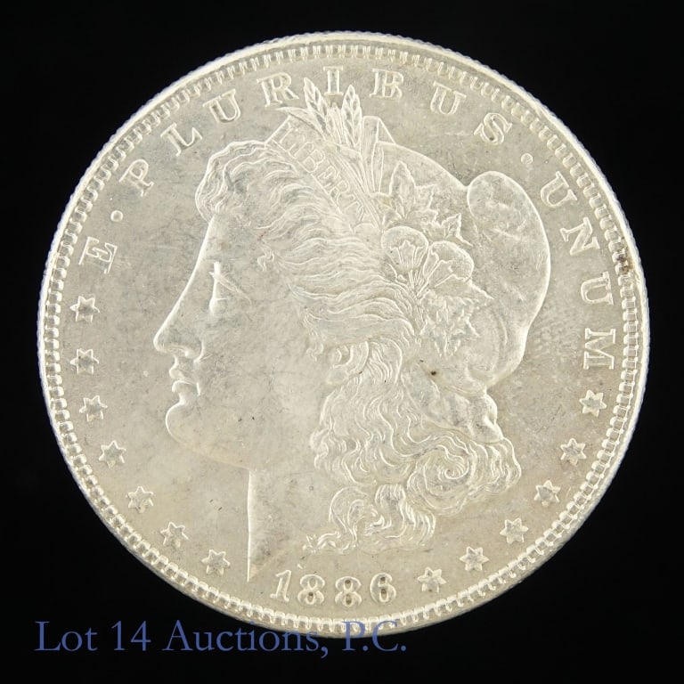 1886 (P) USA Silver Morgan Dollar (CH BU*): 1886 (P) United States silver Morgan dollar (Philadelphia Mint). Designer is George T. Morgan. * Per consigner, in CH BU condition. Metal is 90% silver and weighs 26.73 grams. Greysheet wholesale pric