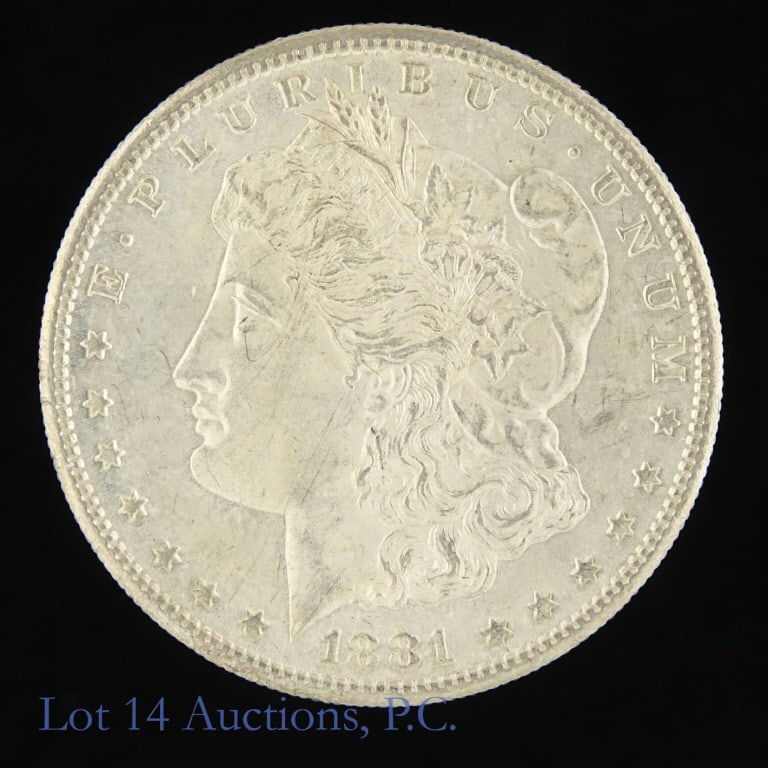 1881-S US Silver Morgan Dollar (CH BU*): 1881-S United States silver Morgan dollar (San Francisco Mint). Designer is George T. Morgan. * Per consigner, very clean cheek in CH BU condition. Metal is 90% silver and weighs 26.73 grams. Greyshee