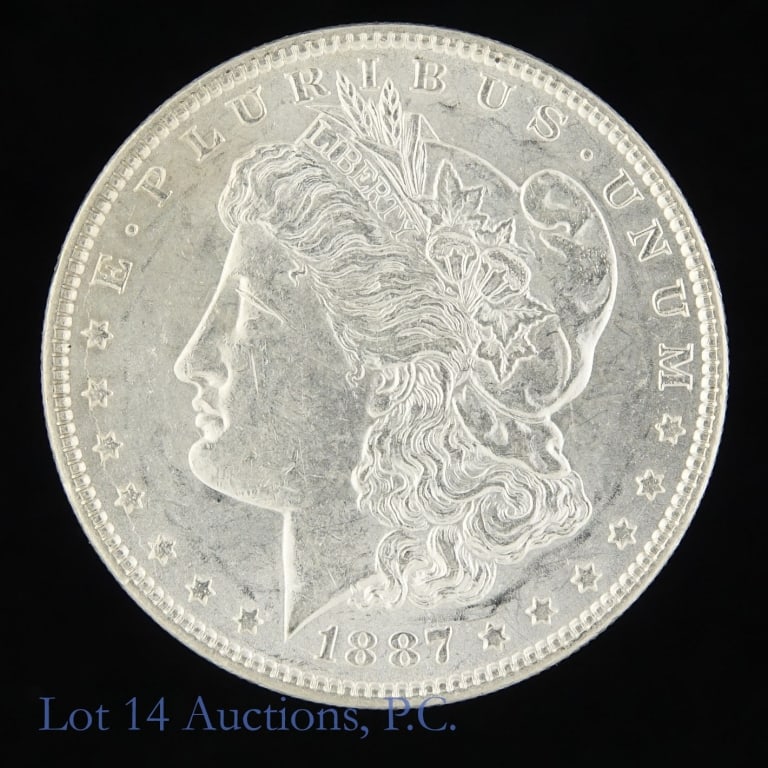 1887 (P) US Silver Morgan Dollar (BU*): 1887 (P) United States silver Morgan dollar (Philadelphia Mint). Designer is George T. Morgan. * Per consigner, in BU condition. Metal is 90% silver and weighs 26.73 grams. Greysheet wholesale