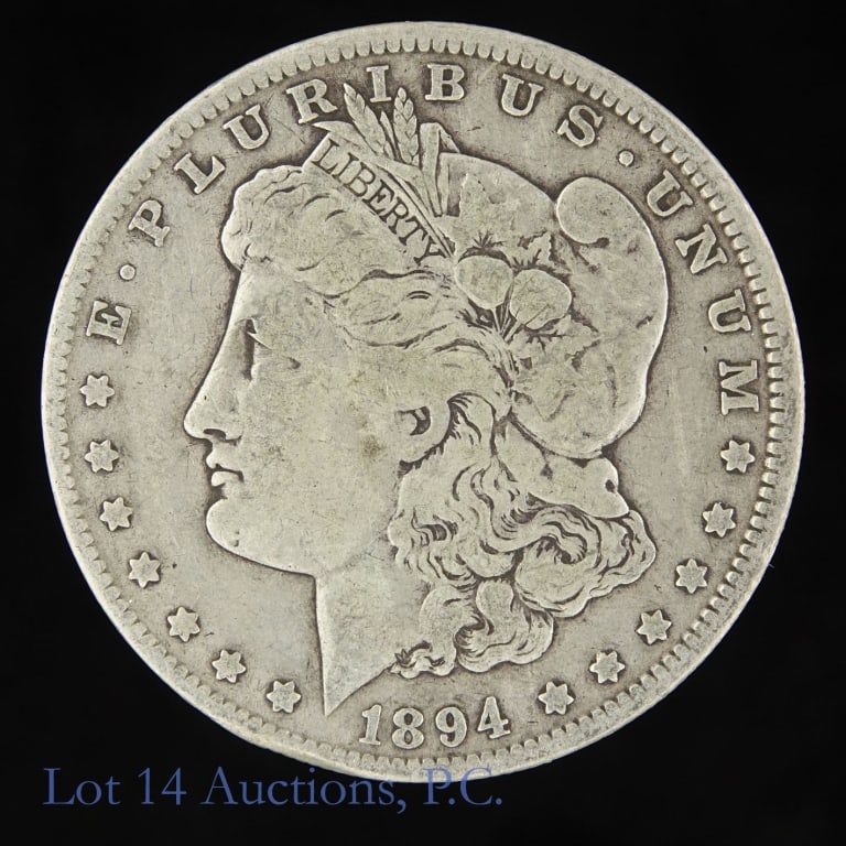 1894-O US Silver Morgan Dollar (Better Date!): 1894-O United States silver Morgan dollar (New Orleans Mint). Designer is George T. Morgan. Per consigner, a better date. Metal is 90% silver and weighs 26.73 grams. Mintage is 1,723,000 with a